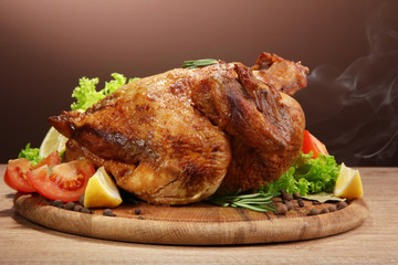 Whole roasted chicken with vegetables,