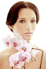 Naklejka premium girl with pink orchid