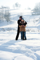 Fototapeta na wymiar Young couple in winter
