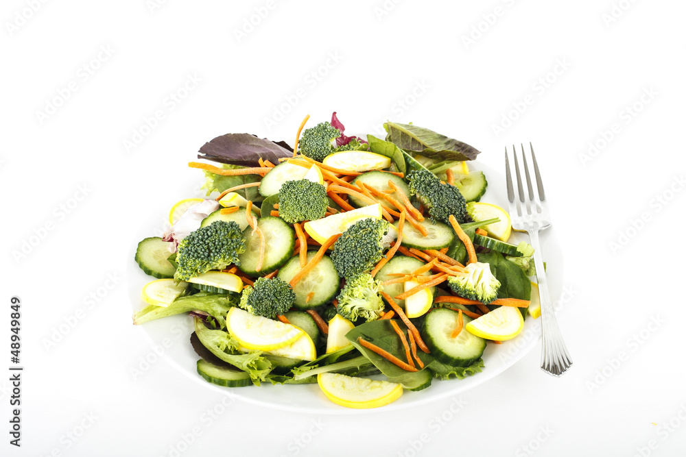 Wall mural Fresh Vegetable Salad in White Bowl with Fork