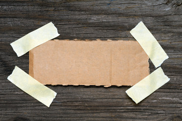 Torn piece cardboard