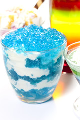 Dessert blue jelly in bowl with whipped cream