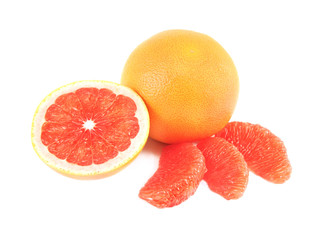 Fototapeta na wymiar whole and cut grapefruit isolated on white background