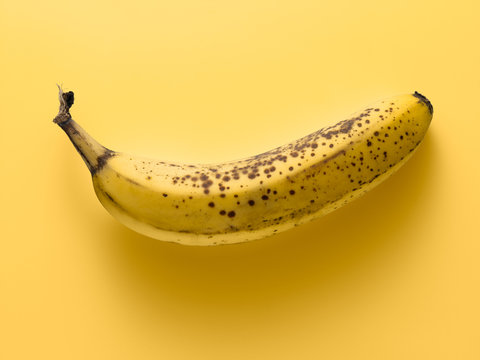 banana on a yellow background, tone on tone