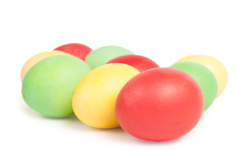 Bright colorful eggs isolated on white