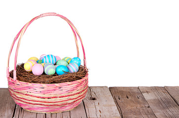 Fototapeta na wymiar Easter Basket with Easter eggs