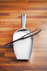 vanilla pods and sugar on scoop