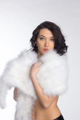 Beautiful girl in a fur shawl