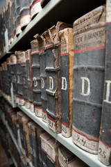 Aged, old books on bookshelf