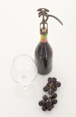 photo of bottle opener on white background pulling a cork 