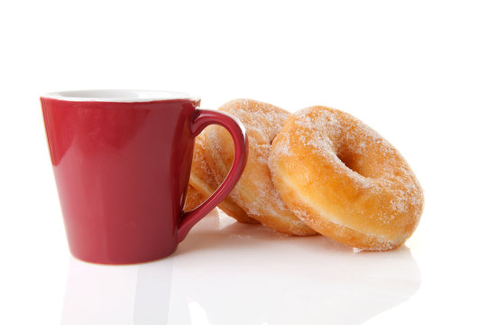 cup of coffee and donuts