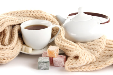 cup of tea with scarf isolated on white