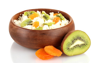 Cottage cheese in color bowl with fruits, isolated on white