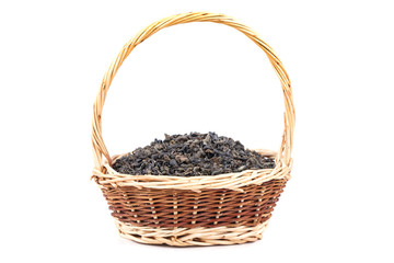 Fototapeta na wymiar dry tea leaves in a basket