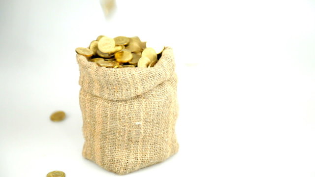 Golden coins fall from above and fill a linen bag