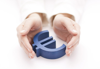 Euro sign protected by hands