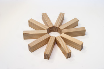 Wooden bricks in a star ring