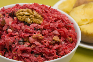 Salad with beets, dried plums, nuts