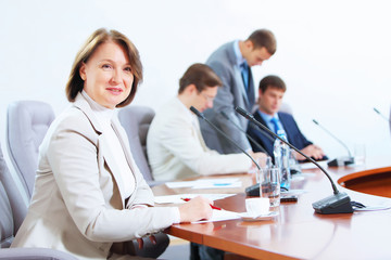 Obraz premium Four businesspeople at meeting