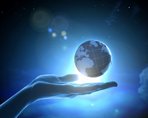Image of earth planet on hand