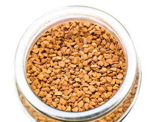 Instant coffee in a glass bottle Topview isolated on white backg