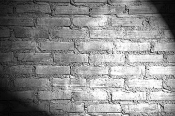 Spotlight on the brick wall