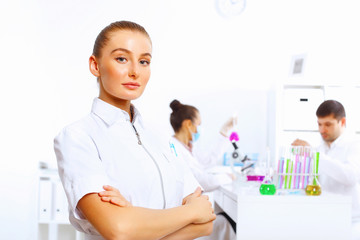 Team of scientists working in laboratory