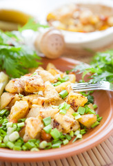 Potatoes cooked in the oven with onions