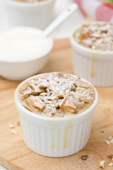 apple pie with nuts in a white ramekin closeup