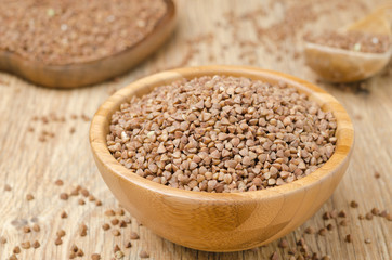 Buckwheat in a wooden bowl horizontal