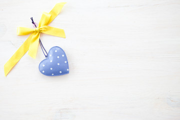 White wooden background with hearts
