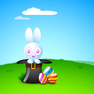 Cute Easter Bunny with beautiful painted Easter Eggs on grass, n