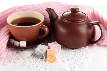 cup of tea with scarf isolated on white