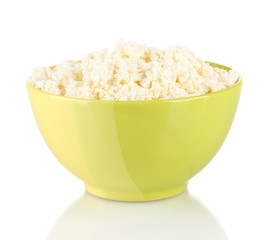 Cottage cheese in color bowl, isolated on white