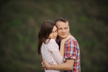 Fototapeta premium Girl Hugs Her Boyfriend