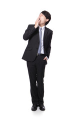 overworked business man yawning