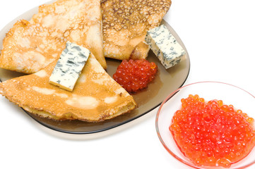 pancakes with cheese and red caviar on white background