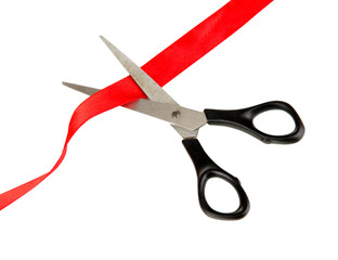 Cutting red ribbon isolated on white