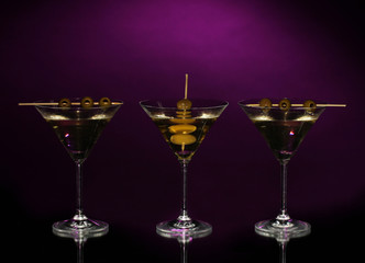 Martini glasses on dark background