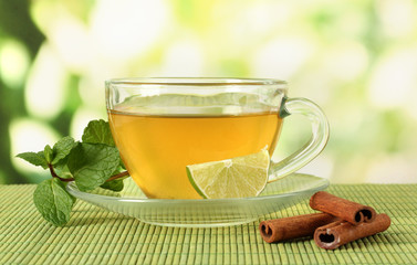 Cup of tea with mint,lime and cinnamon