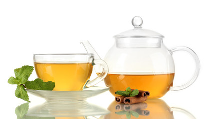 Cup of tea with mint and cinnamon isolated on white