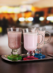 Cream cocktails on table in cafe