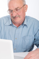 Mature man with laptop