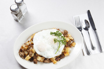 Hearty egg and corned beef hash breakfast