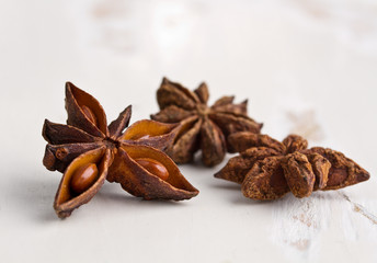 anise stars  on old wooden table