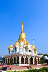 Fototapeta na wymiar Nine tops pagoda, thai style at thai temple kushinagar, India