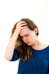Fototapeta premium woman with migraine, holding her head