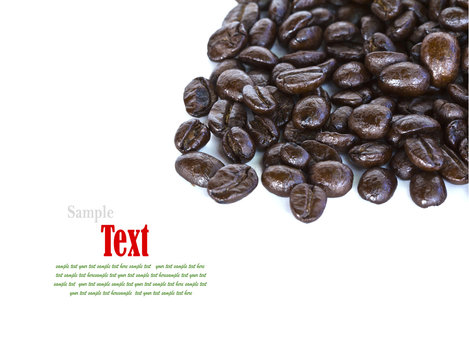 Close up of coffee beans on white background with copy space.