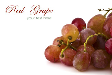 Close up of red grapes on white background with copy space.