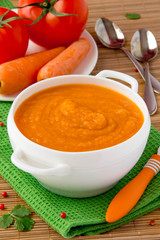 vegetable cream soup with parsnip, carrots and tomatoes